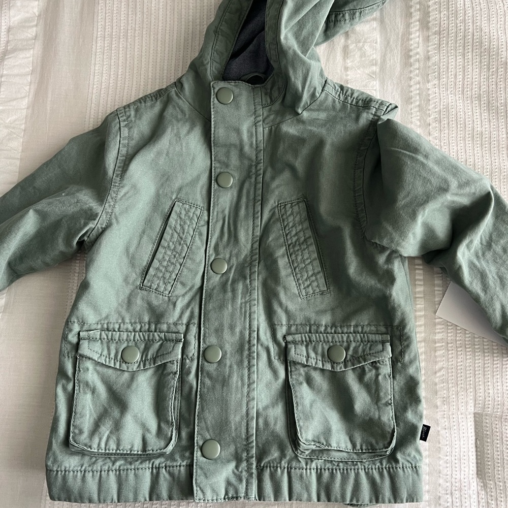 Adorable toddler coat with hood.